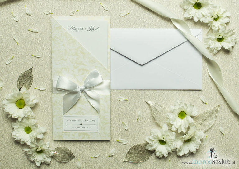 Wyjątkowo prestiżowe, dwuczęściowe zaproszenia ślubne. Charakterystyczna prostokątna okładka w złote róże na białym tle, biała kokardka i wnętrze drukowane na jasnym papierze. ZAP-89-51 - ZaprosNaSlub